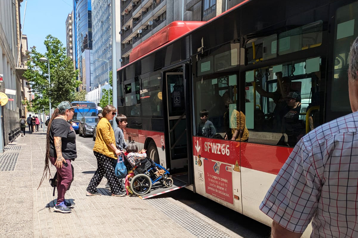 Santiago-Irene-Gomez-Varo-1200 A huddle of mothers with prams waiting for a lift on Vienna's metro